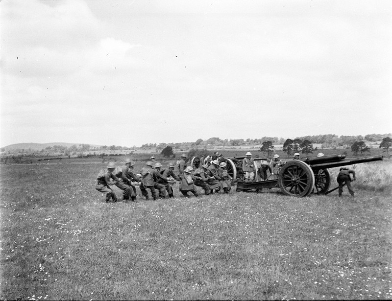 [Soldiers positioning a gun.] - UCD Digital Library