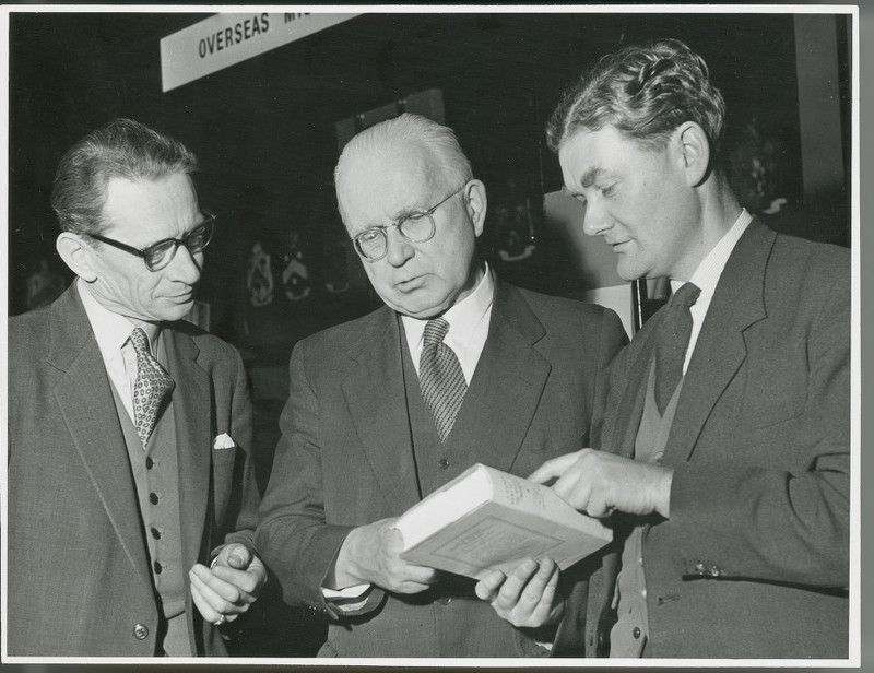 Photograph of Michael Tierney and two unidentified men at the Longmans ...