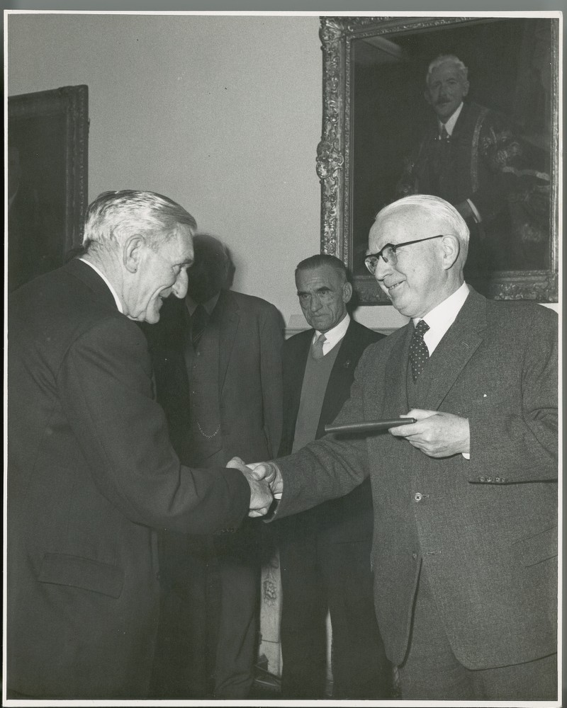 Photograph of Michael Tierney presenting J. Hughes with a wallet. - UCD ...