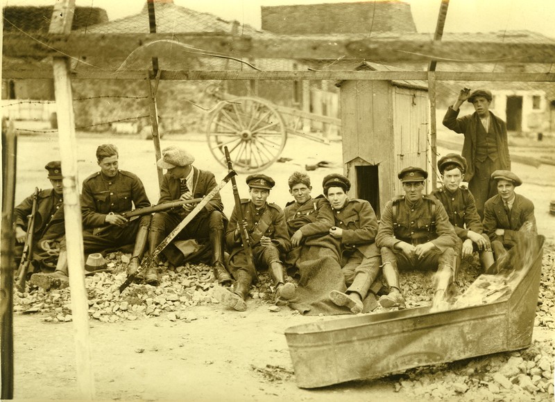 Irish Free State Army soldiers sitting and reclining on the road - UCD ...