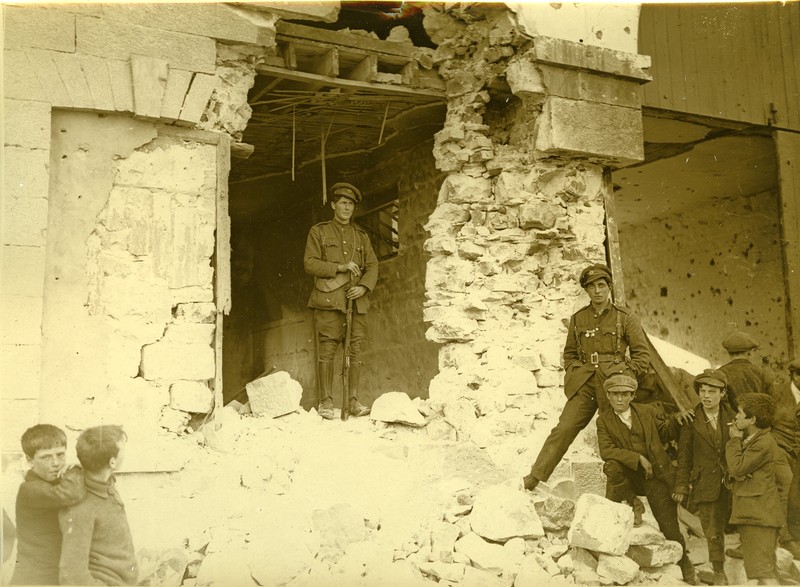 Irish Free State Army soldier standing on guard with his rifle on the ...