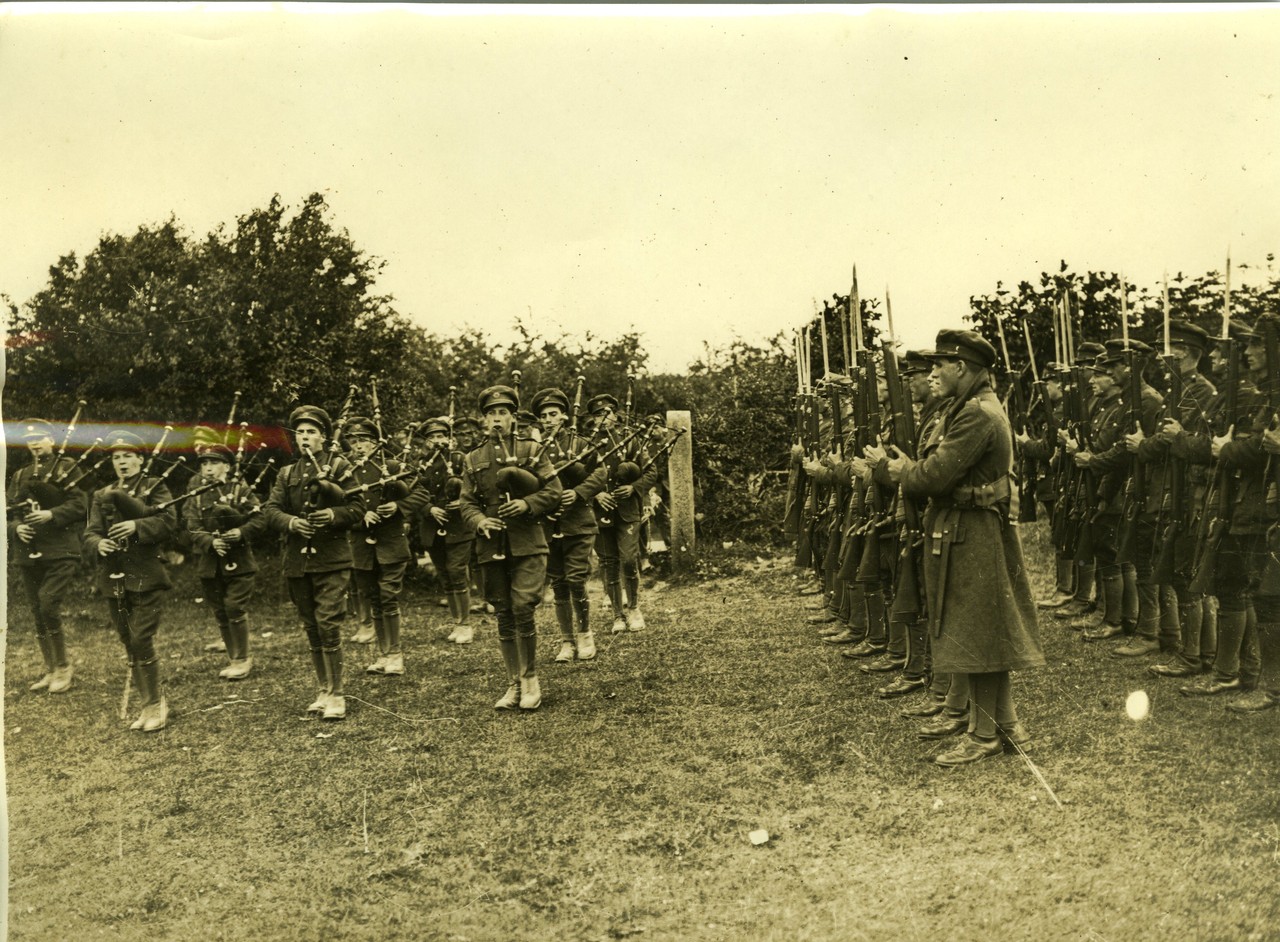 Irish Free State Army soldiers standing in formation with an army band ...