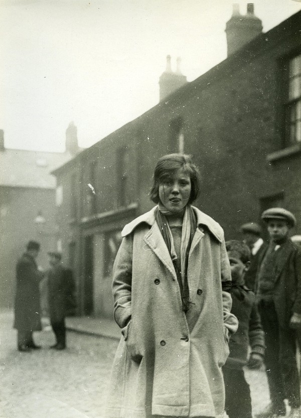 young girl wearing an ill-fitting coat - UCD Digital Library